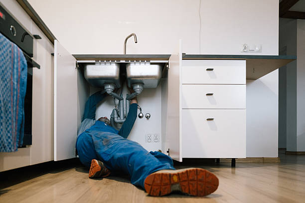 Professional Emergency Plumber technician working in Boonville, IN